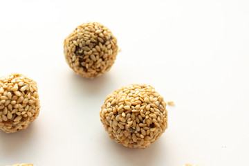 Healthy homemade cookies with nuts and sesame on white background