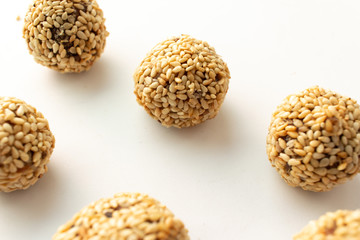 Healthy homemade cookies with nuts and sesame on white background