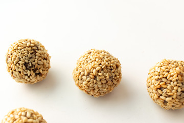 Healthy homemade cookies with nuts and sesame on white background
