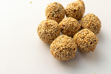 Healthy homemade cookies with nuts and sesame on white background