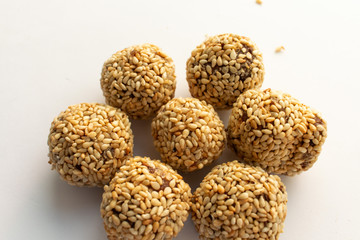 Healthy homemade cookies with nuts and sesame on white background
