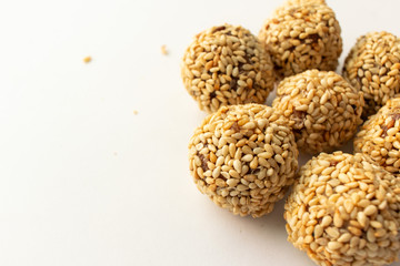 Healthy homemade cookies with nuts and sesame on white background