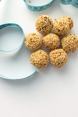 Healthy homemade cookies with nuts and sesame on white background