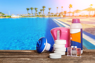 Equipment with chemical cleaning products and tools for the maintenance of the swimming pool.