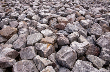 Close up of boulders sea defence background
