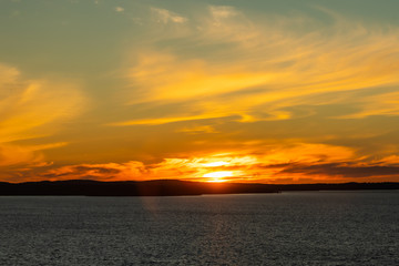 Fototapeta premium Beautiful sunset with clouds over lake Nasijarvi in Tampere, Finland