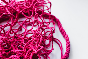 Pink string bag background, net pattern