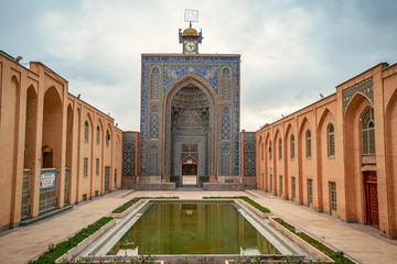 10/05/2019 Kerman,.Kerman Province.Iran, facade of Friday Mosque of Mozaffari with complex floral...