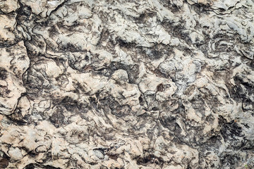 Aged Rock formation background and wallpaper.