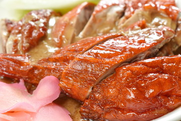 roasted duck meat and pickled ginger dipping sweet soy sauce on plate