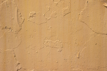 Old Dirty Plaster Wall, With Flakes Of Paint. Rough Surface. Old Weathered Painted Background Texture. Vintage Scratch Grunge Urban Background. Distress texture for your design.