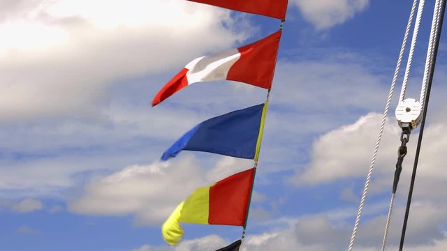 Pennants and flags of Kruzenshtern a four-masted barque moored to the quays of the Garonne River during the "Bordeaux fete le fleuve" celebration