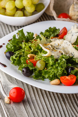 salad provence with blue cheese on wooden table