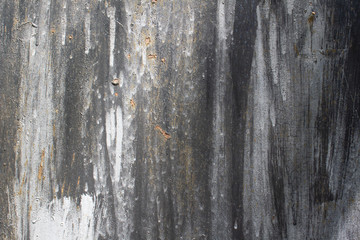 texture of white and black paint on old aged rusty metal wall