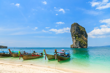 Beautiful crystal clear turquoise blue sea and boats at Ko Poda Island, Ao Phra Nang bay, Krabi, Thailand