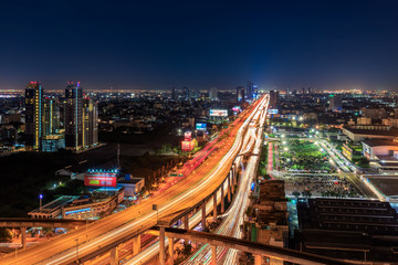 Expressway arial view during night with light trail, Bang Na, Bangkok Thailand