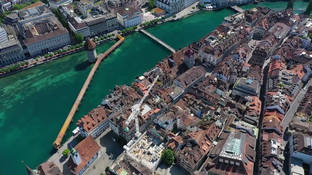 Aerial view of cityscape of Lucerne, historic centre of city, famous landmark Chapel Bridge (Kapellbr&uuml;cke) across river Reuss - landscape panorama of Switzerland from above, Europe