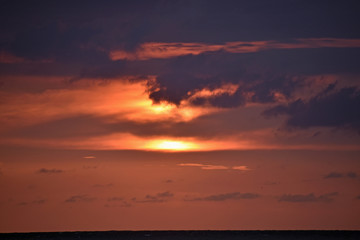 Obraz premium Red Sunset at the Beach