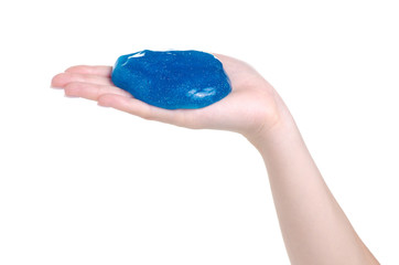 Blue slime for kids, transparent funny toy in hand on white background isolation