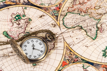 Obraz na płótnie Canvas Vintage pocket watch clock on ancient map background