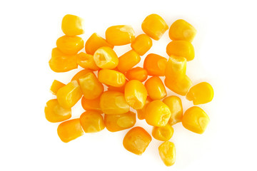 Yellow corn seeds isolated on white background close up. macro