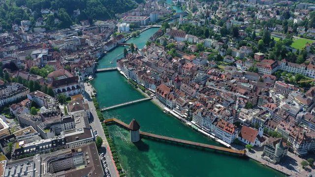 Aerial view of cityscape of Lucerne, historic centre of city, famous landmark Chapel Bridge (Kapellbr&uuml;cke) across river Reuss - landscape panorama of Switzerland from above, Europe