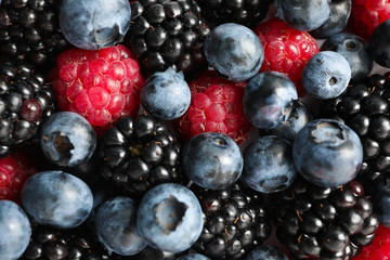 Heap of fresh berries as background, close up