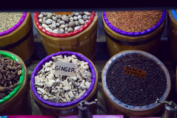 counter in the store with spices ginger pepper
