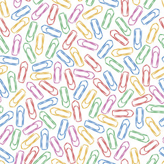 Seamless pattern of multicolored paper clips for textiles, interior design, for book design, website background. Back to school illustration.