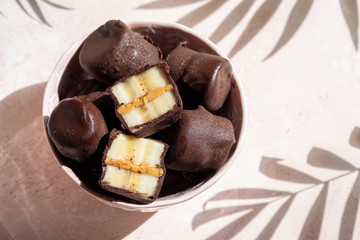 Frozen healthy dessert. Dark Chocolate Peanut Butter Banana Bites