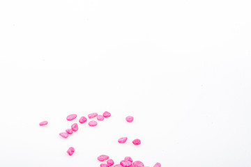 Purple pebbles stone with empty copyspace area for slogan or advertising text message, over isolated white background.