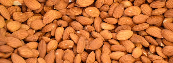 Almond nuts in a huge pile on a market stall in Istanbul