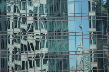 Glass Mirror Building Side in Downtown Manhattan Reflecting Other Buildings