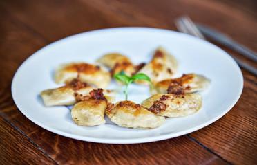 Fresh dumplings served on white plate