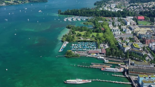 Aerial view of cityscape of Lucerne, lakeside part of city, crystal clear waters of lake Lucerne (Vierwaldstattersee) - landscape panorama of Switzerland from above, Europe