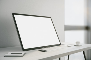 Creative desktop with white computer