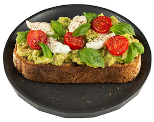 Plate with avocado, mozzarella and tomato sandwich isolated on white.