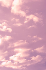 Naklejka na ściany i meble dark blue clouds on pink from sunset sky