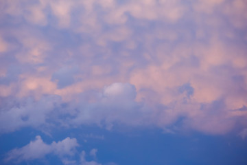 dark blue clouds on pink from sunset sky