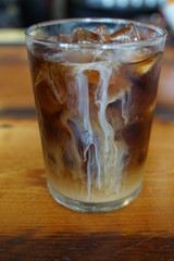 Iced Coffee with Cream on a Restaurant Bar