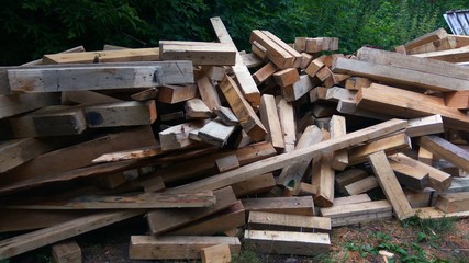 A pile of wood with wooden bars