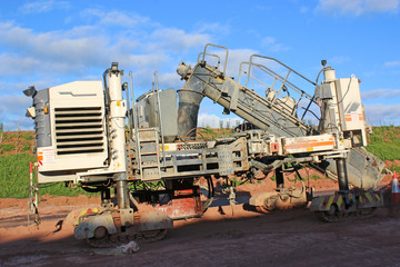 Concrete Paving machine on a road construction site