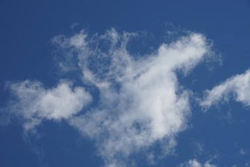 Obraz premium Large White High Depth and Detail Clouds on Brilliant Blue Sky