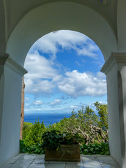view of window with blue sky and clouds