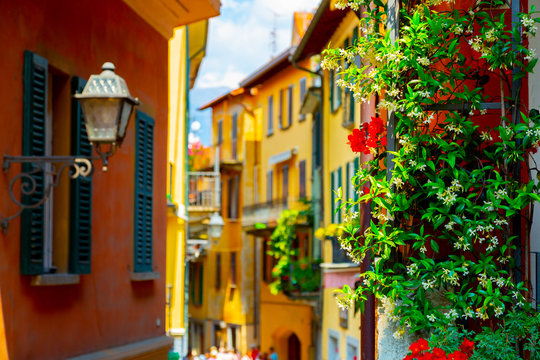 Colorful narrow old town street in Bellagio Town, Italy