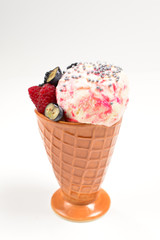 Ice cream with blueberries, blackberries and raspberries on a white background.  Copy space.
