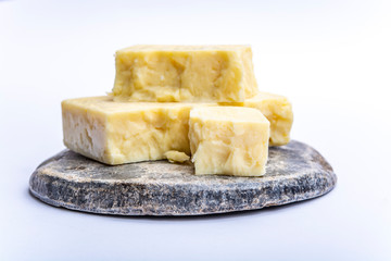 Cheddar cheese collection, block of Cheddar cheese made from cow milk