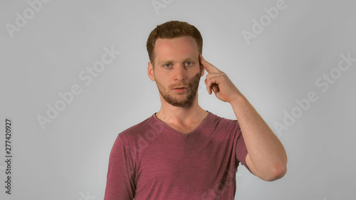 Caucasian Guy With Red Hair Showing Emotion Overwork And Try To