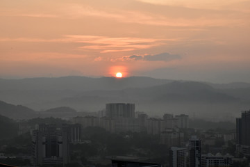 Sun rise over the hills of Kuala Lumpur