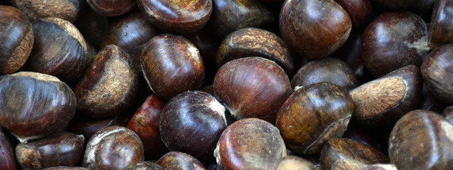 Hot roast chestnuts on sale in a pile in China Town in Kuala Lumpur Malaysia